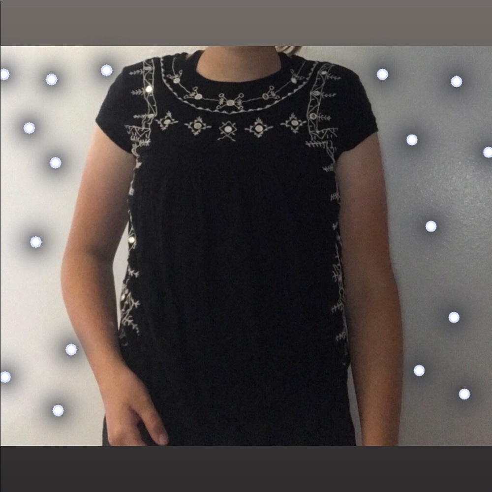black shirt with white embroidery